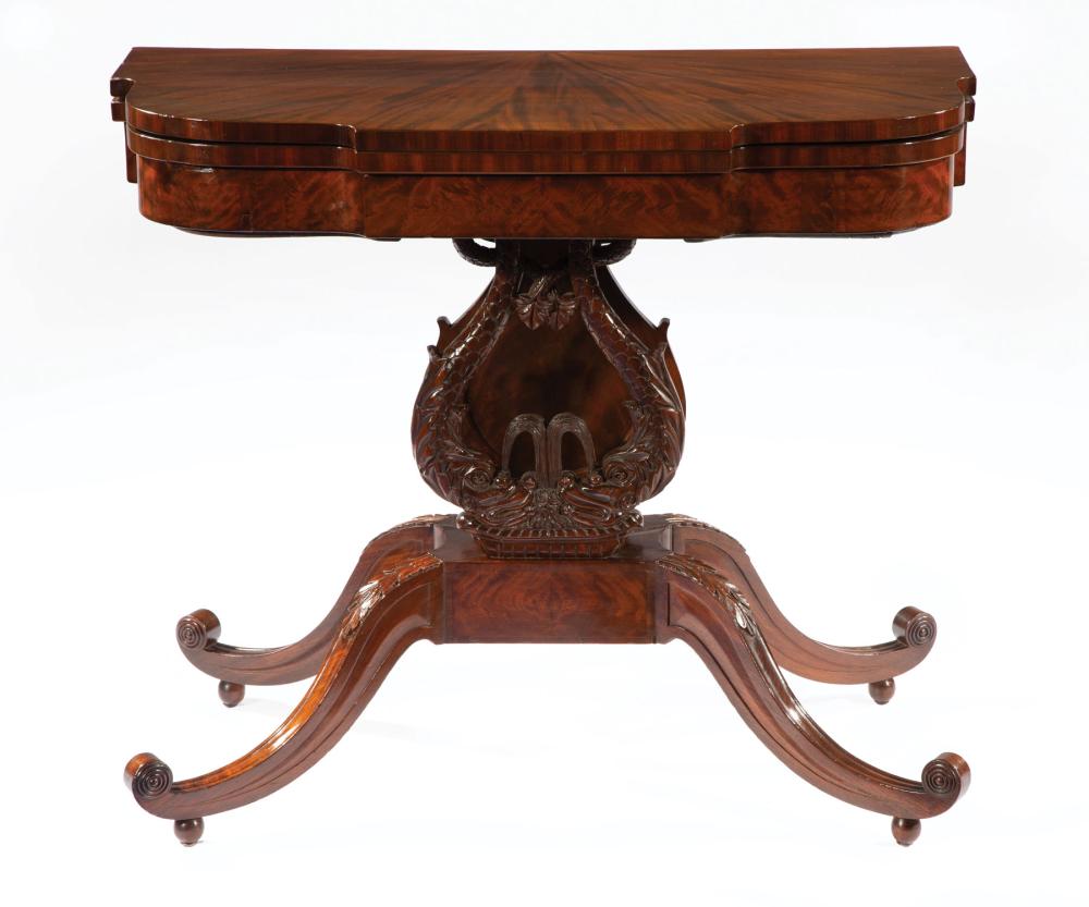 CARVED MAHOGANY GAMES TABLE ATTR.