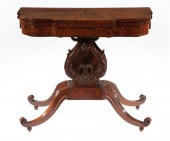 CARVED MAHOGANY GAMES TABLE AT