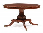 CARVED MAHOGANY TILT-TOP CENTE