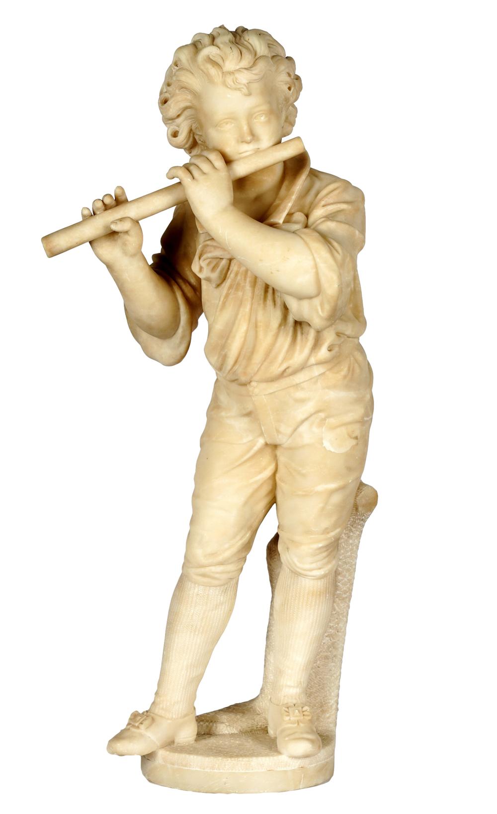 CARVED MARBLE FIGUREdepicting a boy