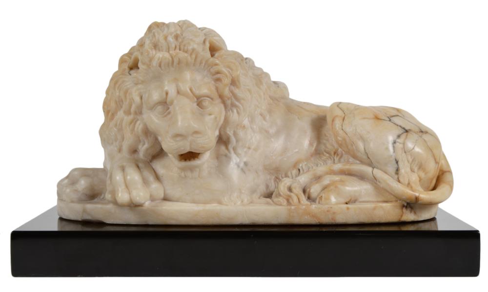 CARVED MARBLE LION RECLINING ON