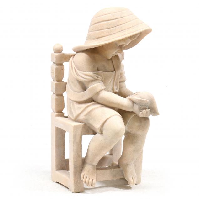 CARVED MARBLE STATUE OF A CHILD