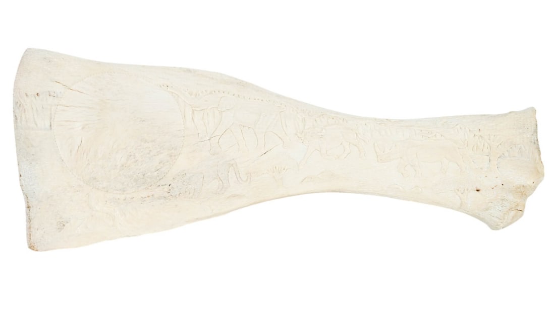 CARVED NATURAL WHALE BONE W