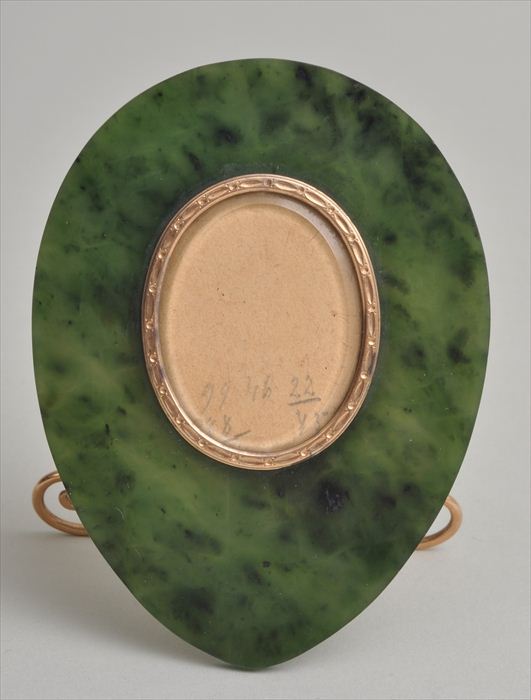 CARVED NEPHRITE AND GOLD PHOTOGRAPH