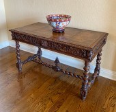 CARVED OAK LEATHER TOP LIBRARY