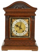 CARVED OAK MANTLE CLOCKwith hi