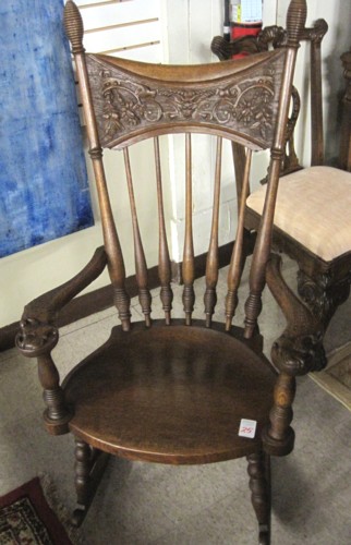 CARVED OAK SPINDLE-BACK ROCKING