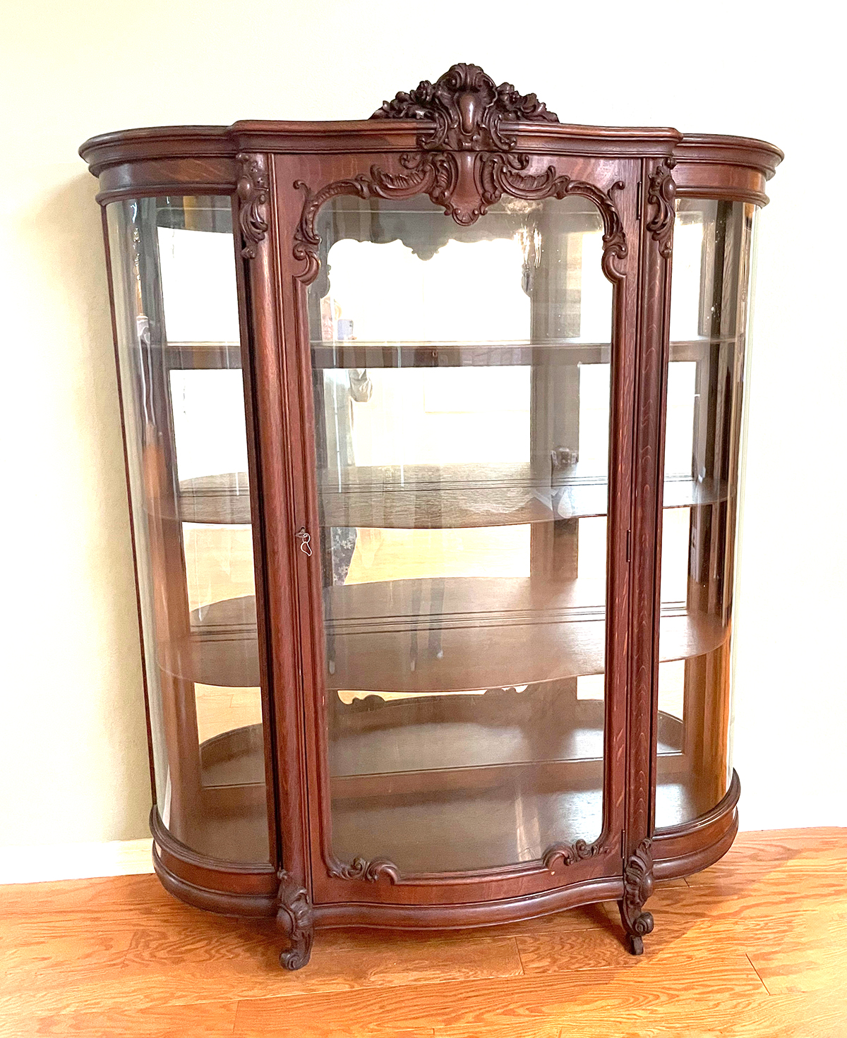 CARVED OAK TRIPLE BOWFRONT CHINA