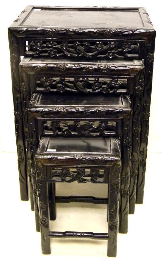 Carved Oriental nest of four