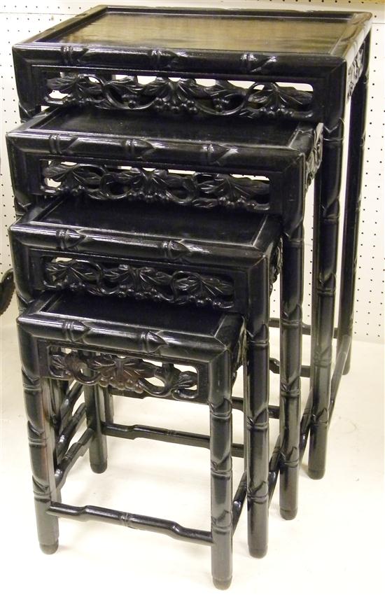 Carved Oriental nest of four