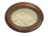 CARVED OVAL PLAQUE.  European