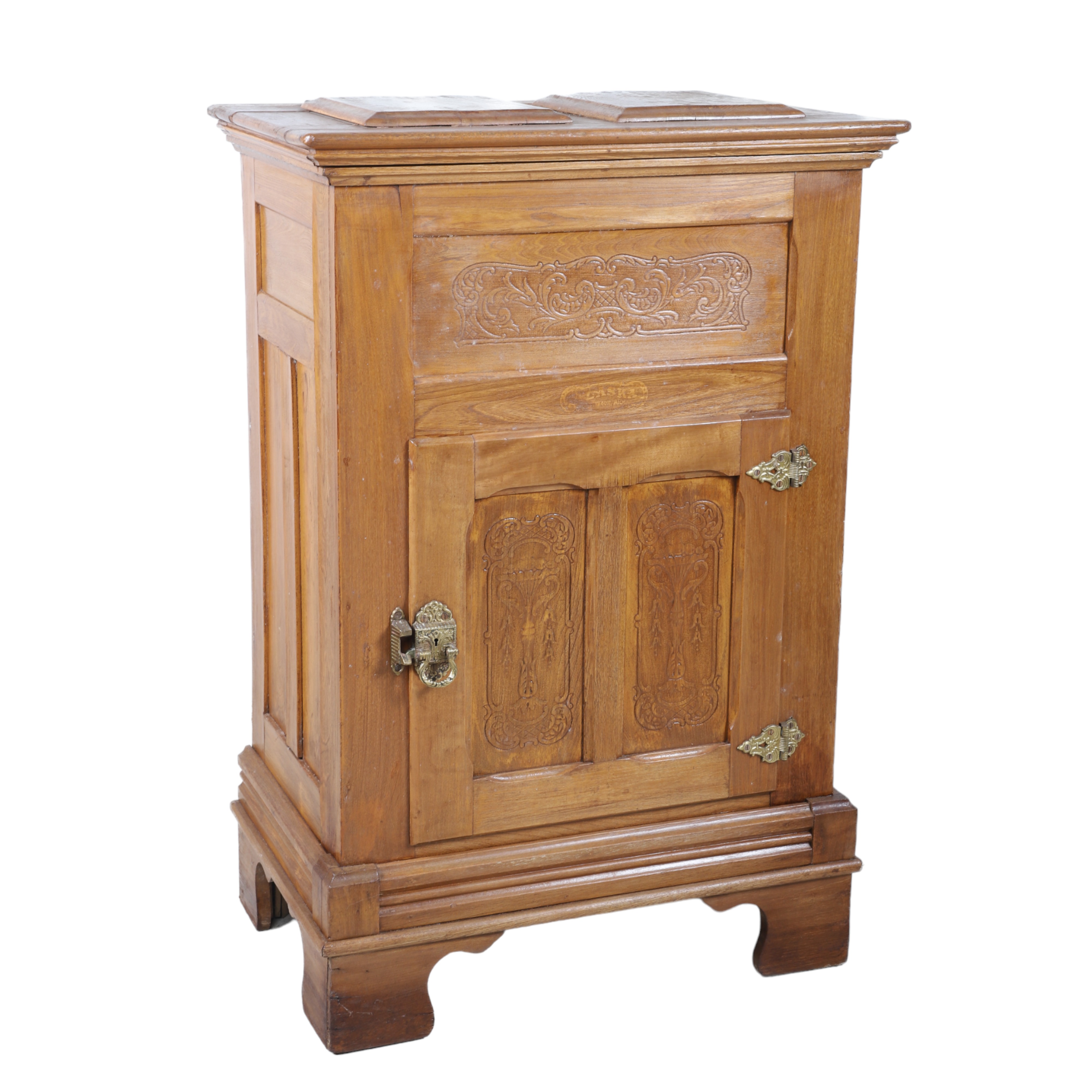 Carved paneled walnut ice box,