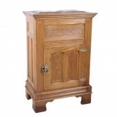 Carved paneled walnut ice box,