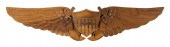 CARVED PINE PLAQUE IN THE FORM