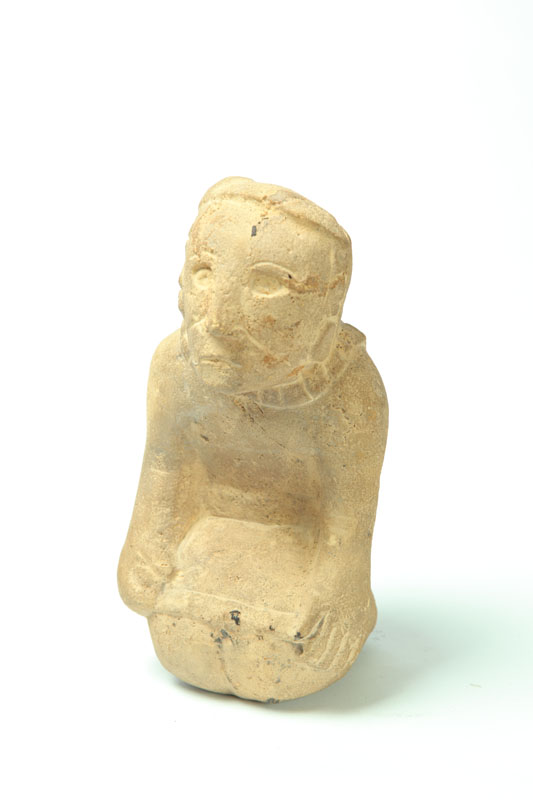 CARVED PREHISTORIC EFFIGY PIPE. 