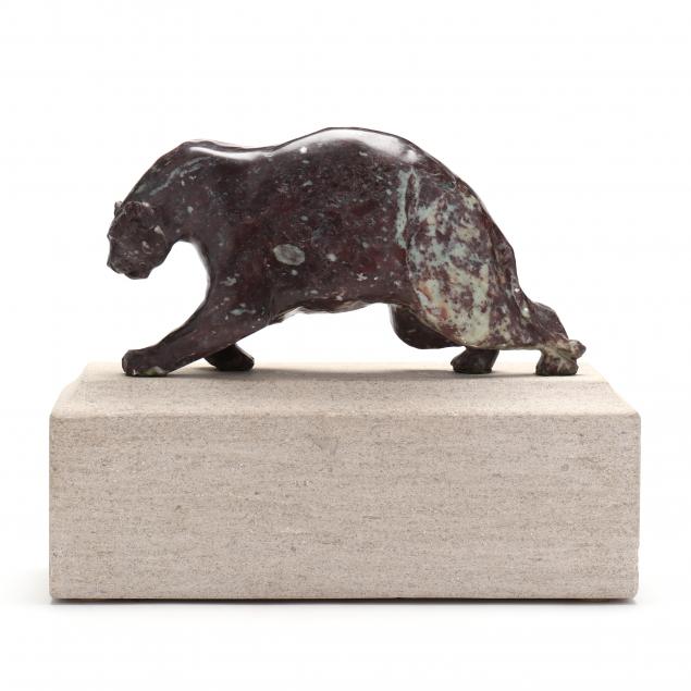 CARVED PURPLE STONE SCULPTURE OF