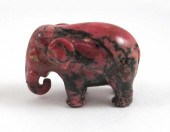 CARVED RHODONITE MODEL OF AN E