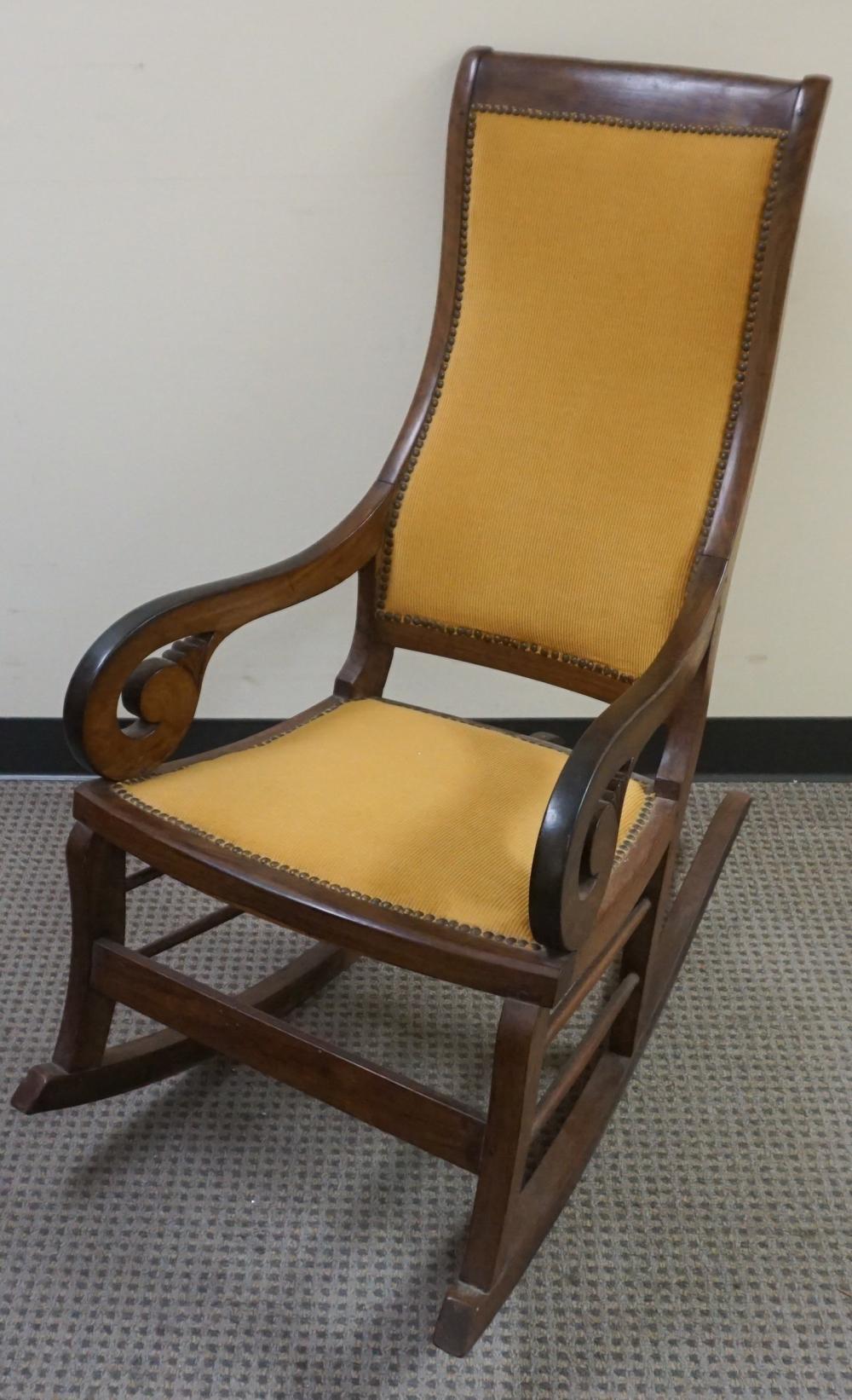 CARVED ROSEWOOD AND UPHOLSTERED ARM