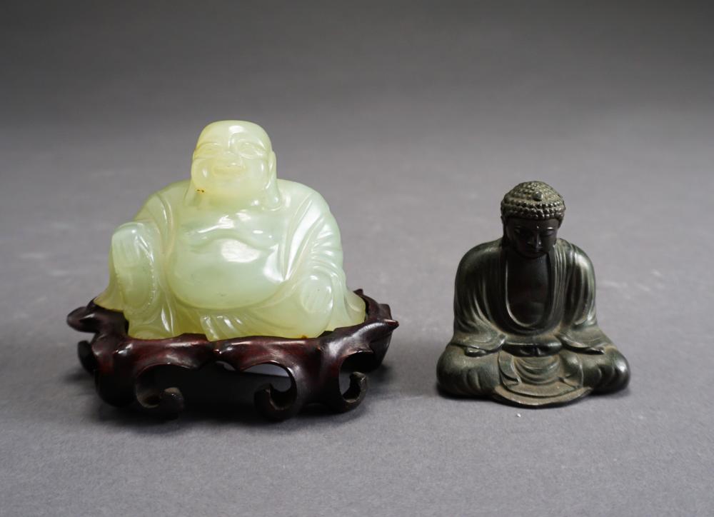 CARVED SERPENTINE BUDDHA ON STAND