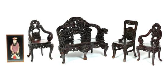 ***CARVED SETTEE AND THREE CHAIRS.