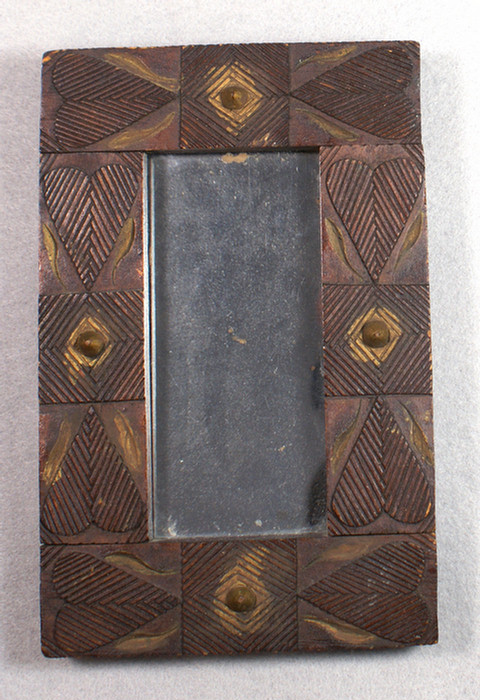 Carved softwood folk art framed