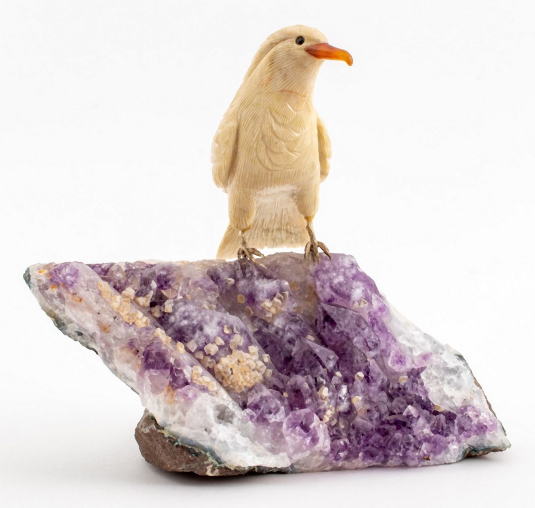 CARVED STONE BIRD ON AMETHYST