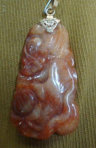 Carved Stone (Carnelian?) Pendant