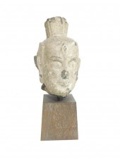 CARVED STONE HEAD OF A LOKAPAL