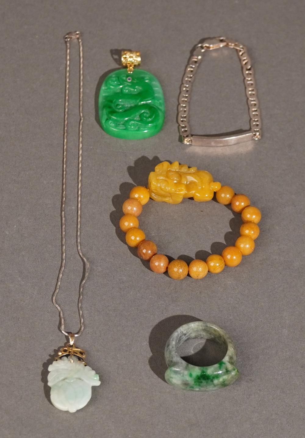 CARVED STONE PENDANT NECKLACE, A