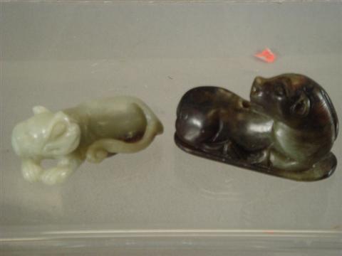 Carved stone reclining cow, 2