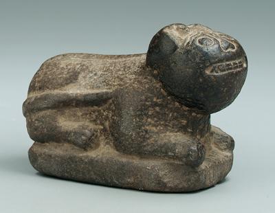 Carved stone recumbent cat,