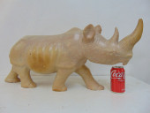 CARVED STONE RHINOCEROS, "GENU