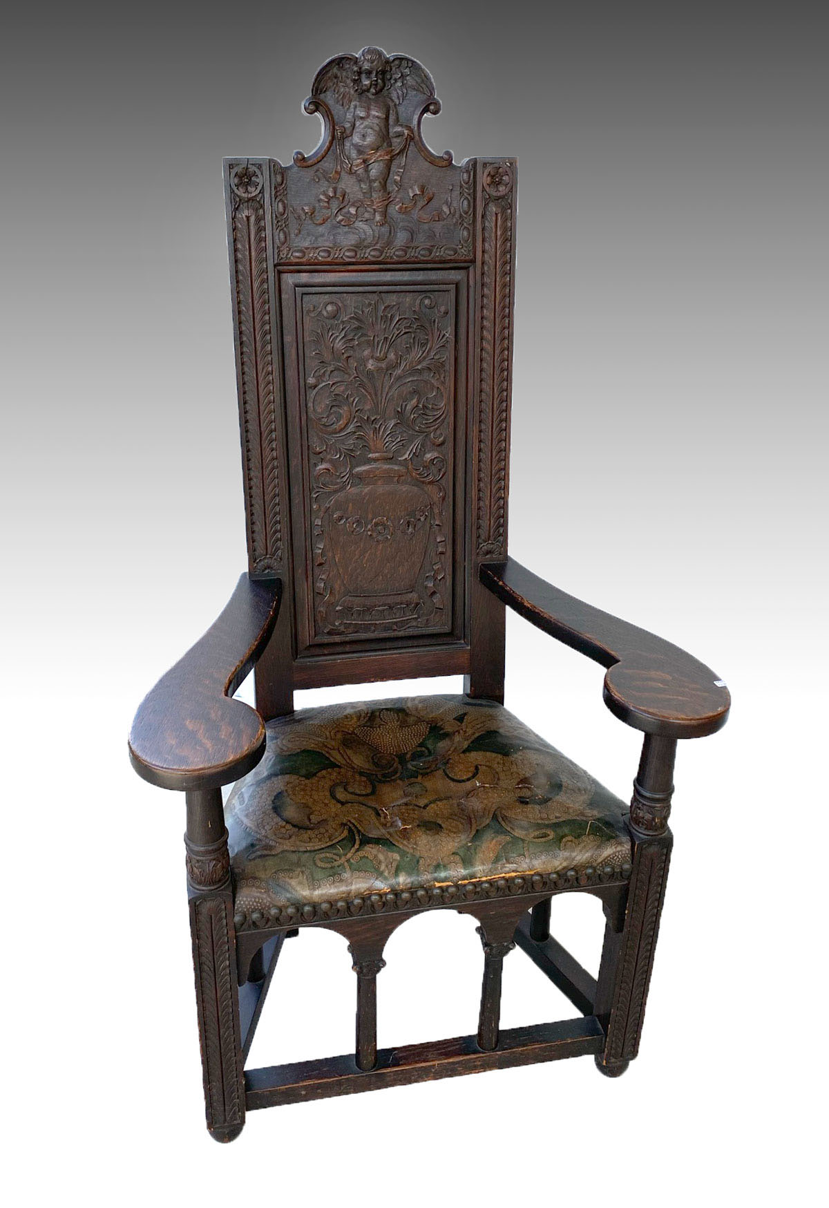 CARVED TIGER OAK ARMCHAIR WITH