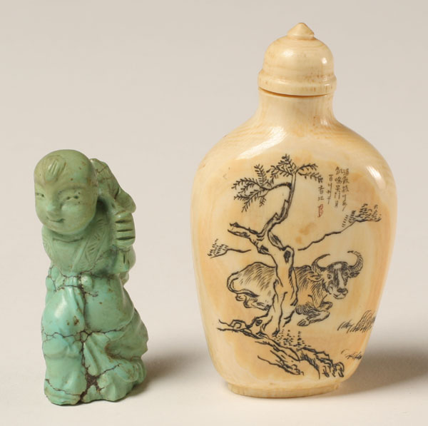 Carved turquoise figure and