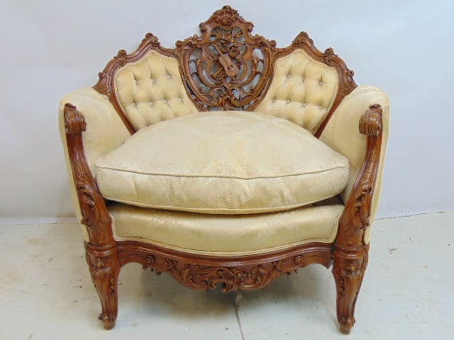 CARVED UPHOLSTERED ARMCHAIR WITH