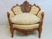 CARVED UPHOLSTERED ARMCHAIR WI