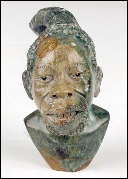 CARVED VERDITE BUST OF AN AFRICAN