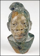 CARVED VERDITE BUST OF AN AFRI