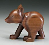 Carved walnut bear cub, signed