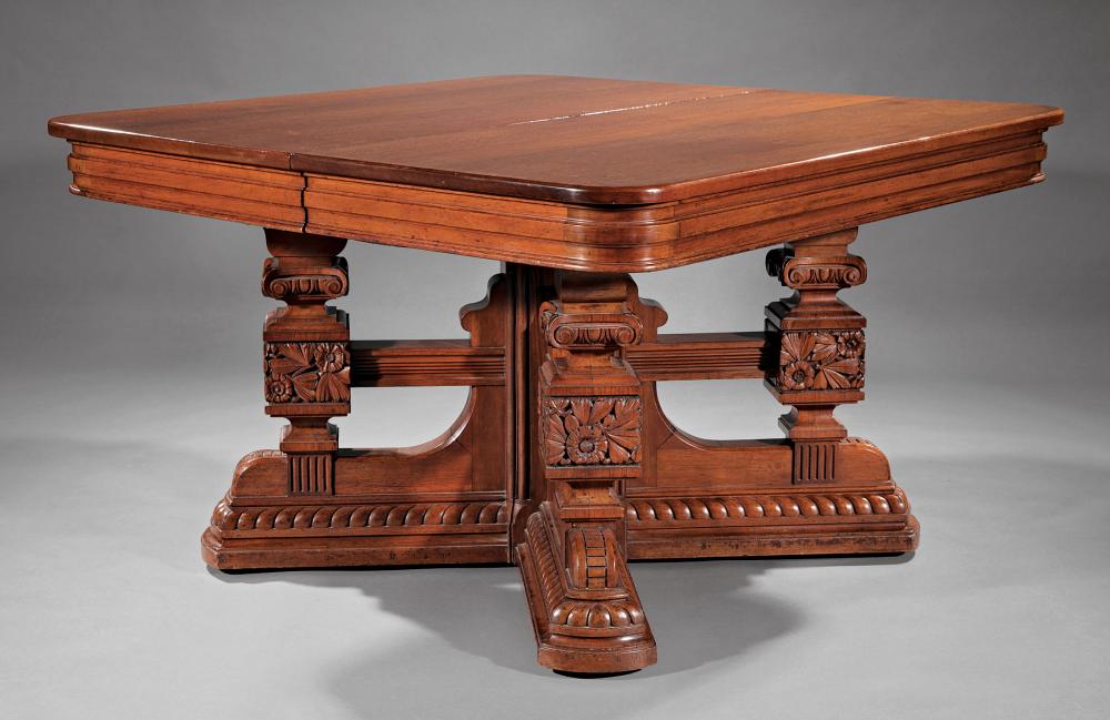 CARVED WALNUT DINING TABLE ATTR.