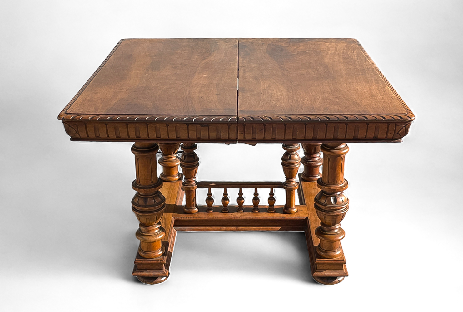 CARVED WALNUT DINING TABLE: