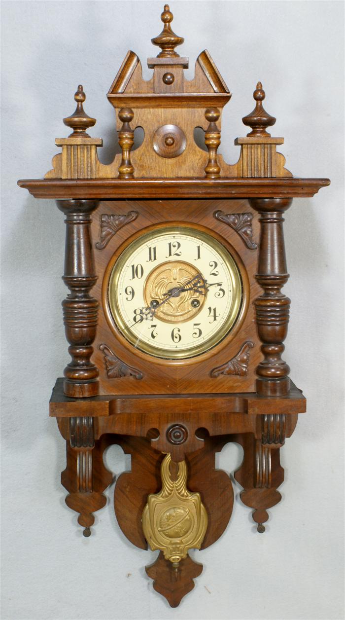 Carved walnut German wall clock,