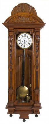Carved walnut two-weight Vienn