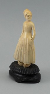 CARVED WHALE IVORY FIGURE OF A