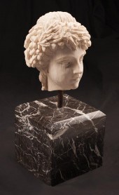 CARVED WHITE MARBLE HEAD OF A