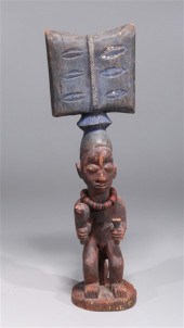 Carved wood African musician f