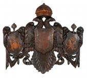 CARVED WOOD AND PAINTED LEATHE