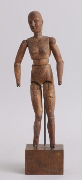 CARVED WOOD ARTICULATED ARTIST