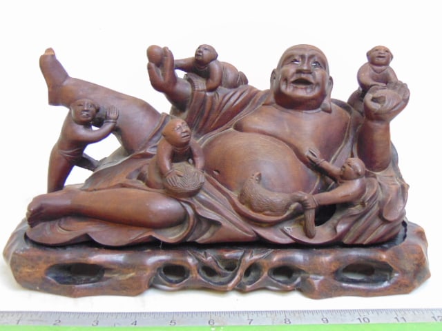 CARVED WOOD BUDDHA FIGURE ON CARVED