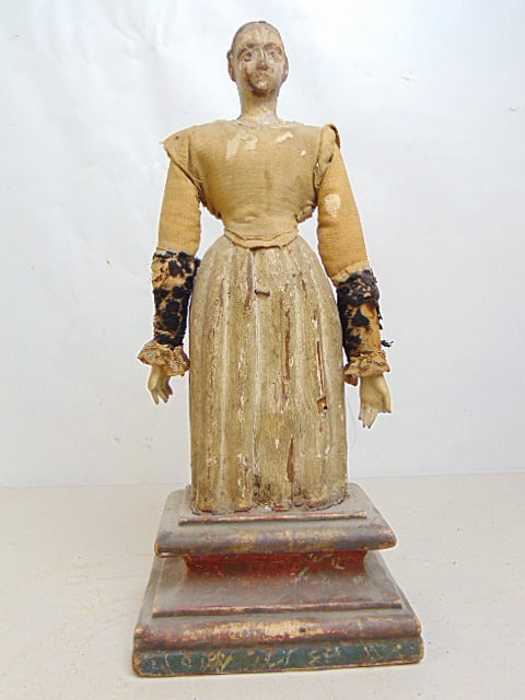 CARVED WOOD FEMALE FIGURE (SANTOS